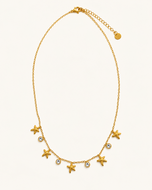 Cadena dorada con circonitas y estrellas de mar para mujer